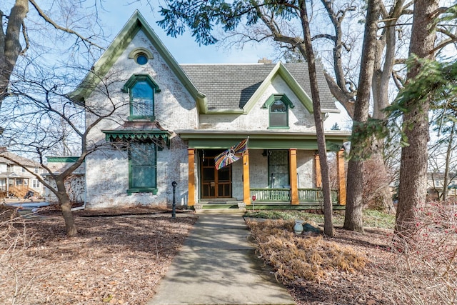 victorian home featuring a porch