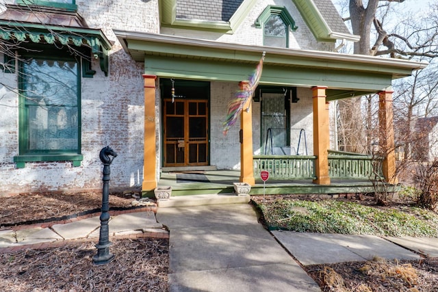 doorway to property with a porch