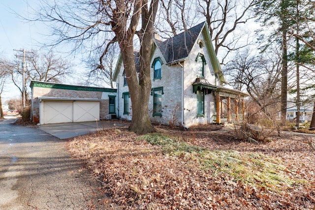 view of property exterior featuring a garage