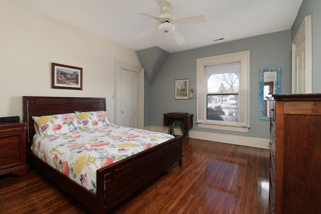 bedroom featuring dark hardwood / wood-style flooring and ceiling fan