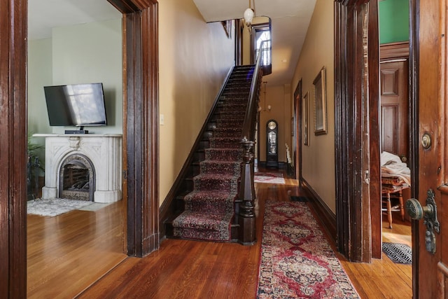 stairway with wood-type flooring