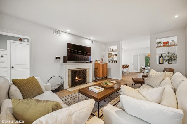 living room with light hardwood / wood-style flooring