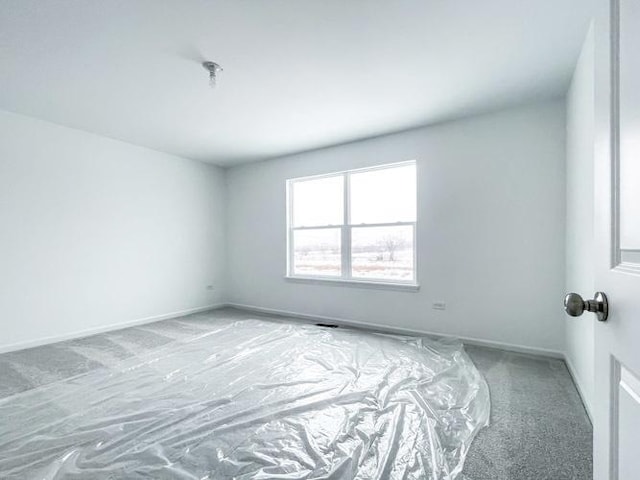 empty room with carpet floors