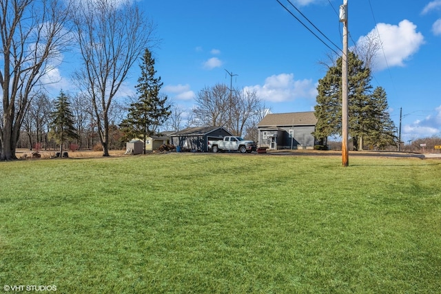 view of yard featuring a carport