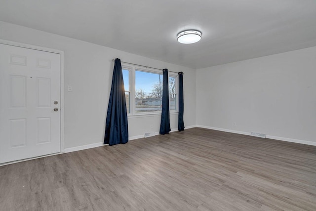 interior space with hardwood / wood-style floors