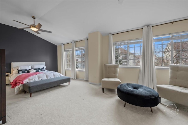 carpeted bedroom with lofted ceiling and ceiling fan