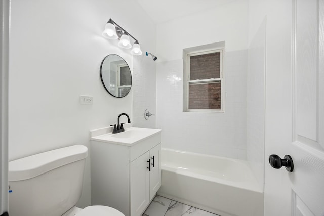 full bathroom with vanity, toilet, and tiled shower / bath combo