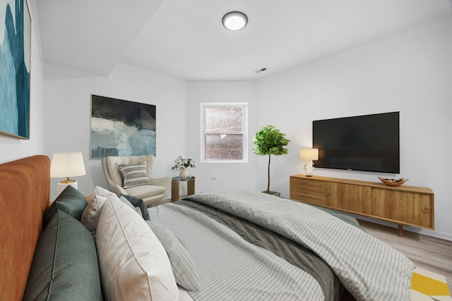 bedroom featuring hardwood / wood-style floors