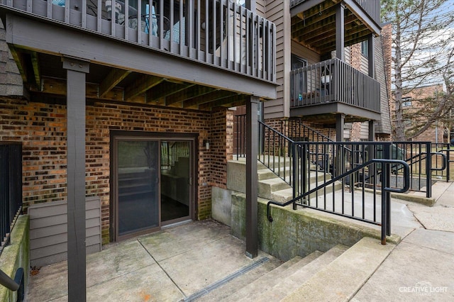 property entrance featuring a patio