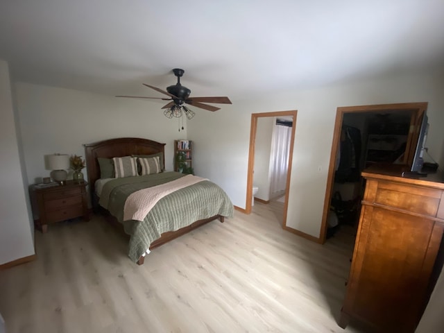 bedroom with light hardwood / wood-style flooring and ceiling fan