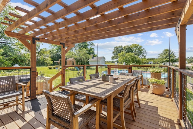 wooden terrace with a yard