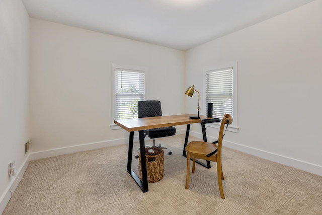 view of carpeted office space