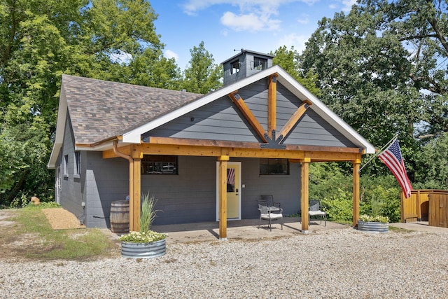 view of front of property with a patio area