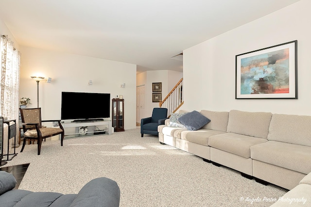 living room featuring carpet