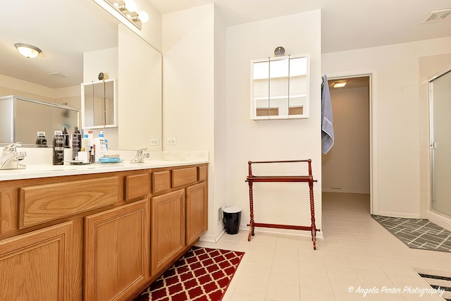 bathroom with vanity and walk in shower