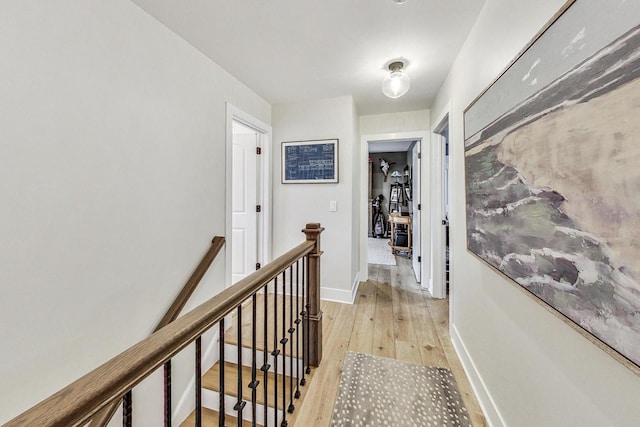 hall with light hardwood / wood-style floors