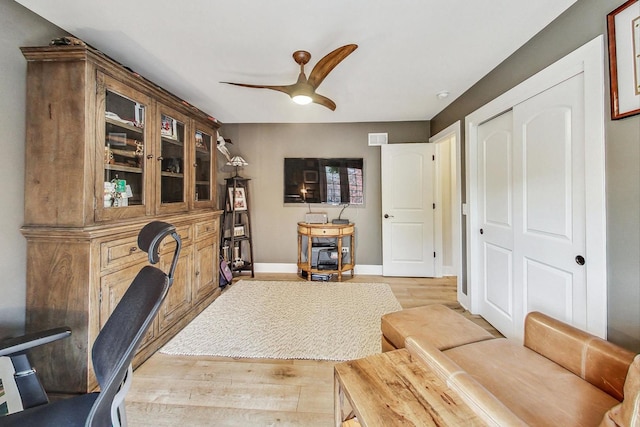 office area featuring ceiling fan and light hardwood / wood-style flooring