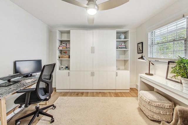 office area featuring ceiling fan and light wood-type flooring