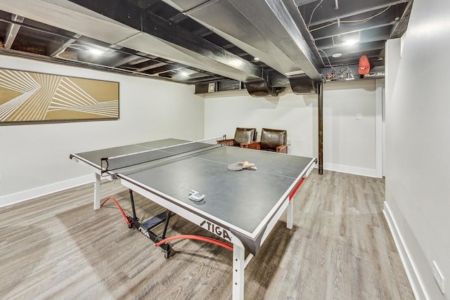 playroom featuring hardwood / wood-style flooring