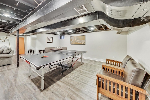 recreation room with light hardwood / wood-style flooring