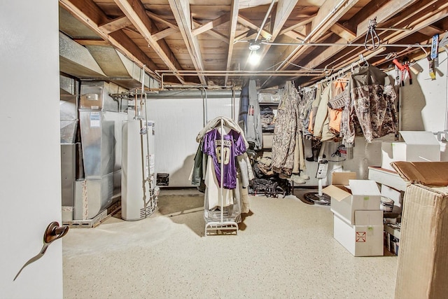 basement with gas water heater and heating unit