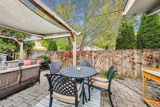 view of patio / terrace with outdoor lounge area and a pergola