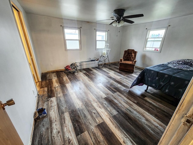 bedroom featuring ceiling fan and hardwood / wood-style floors