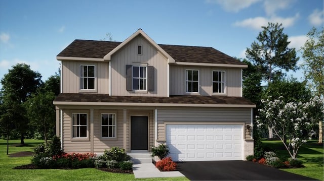 view of front of house featuring a garage and a front yard