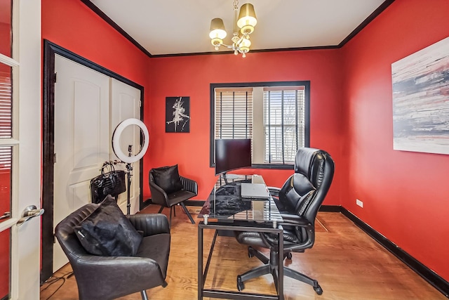 office featuring an inviting chandelier, wood-type flooring, and ornamental molding