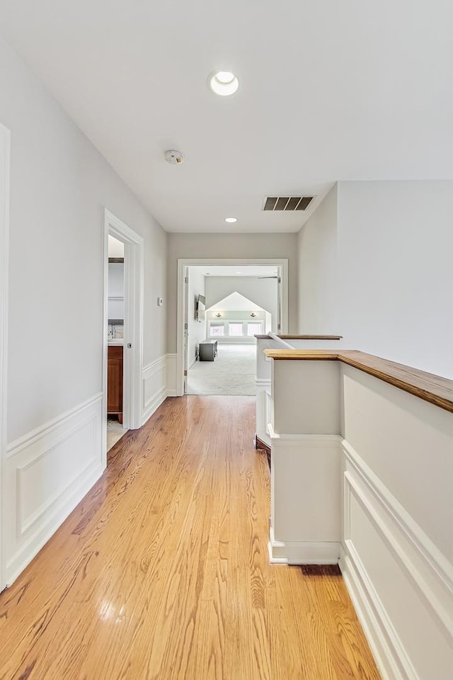 hall featuring light hardwood / wood-style flooring