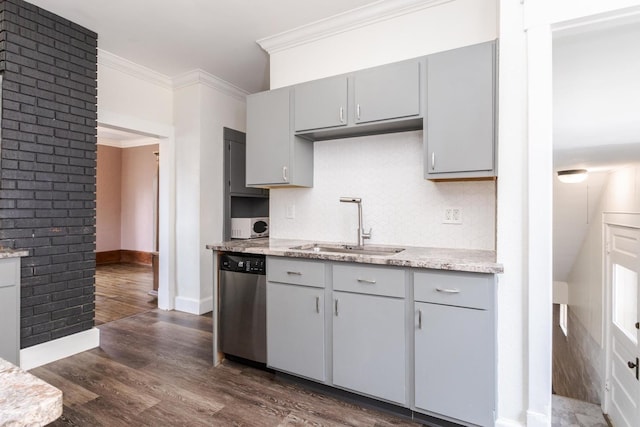 kitchen with a sink, gray cabinets, and dishwasher