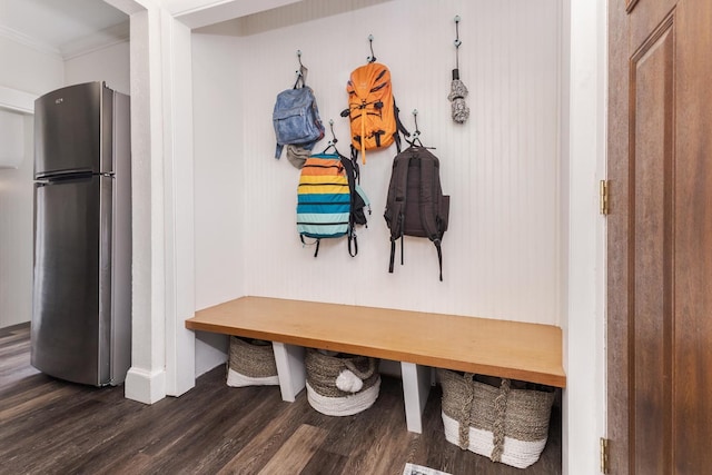 mudroom featuring baseboards, dark wood finished floors, and crown molding