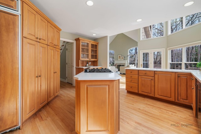 kitchen with recessed lighting, light wood finished floors, and gas cooktop