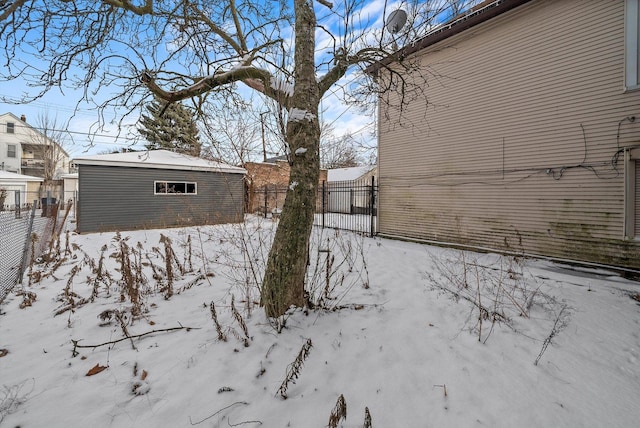 view of yard layered in snow