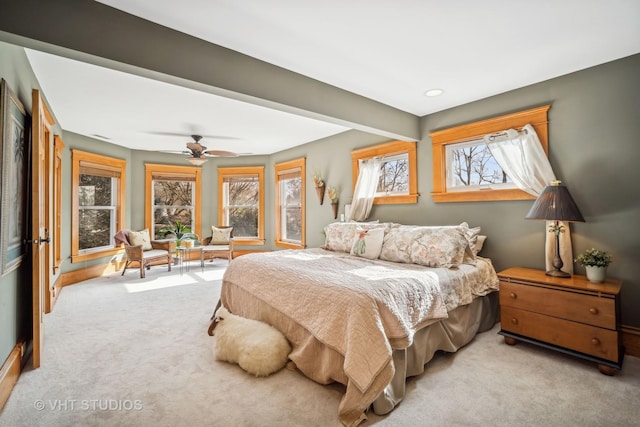 bedroom featuring light colored carpet