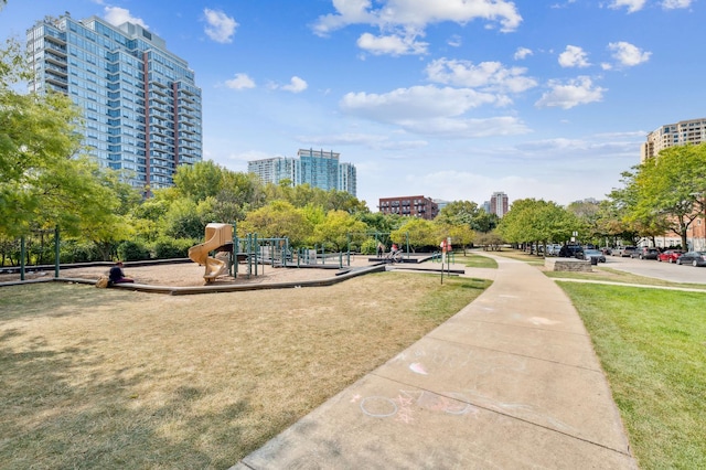 view of community featuring a yard and a playground