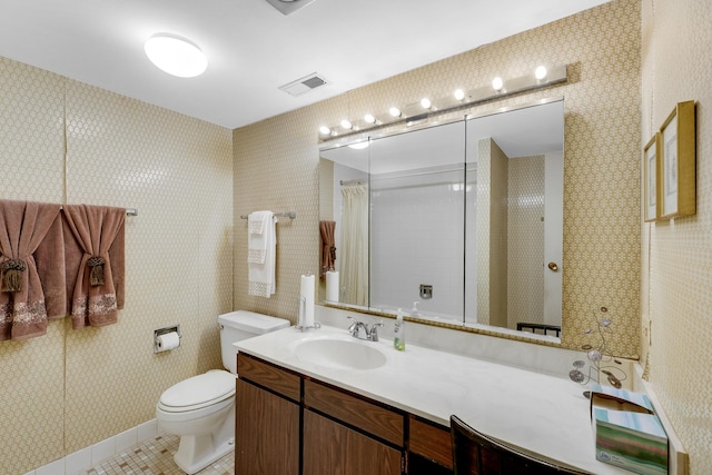 bathroom featuring vanity, tile patterned floors, toilet, and a shower with shower curtain