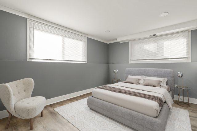 bedroom featuring hardwood / wood-style floors