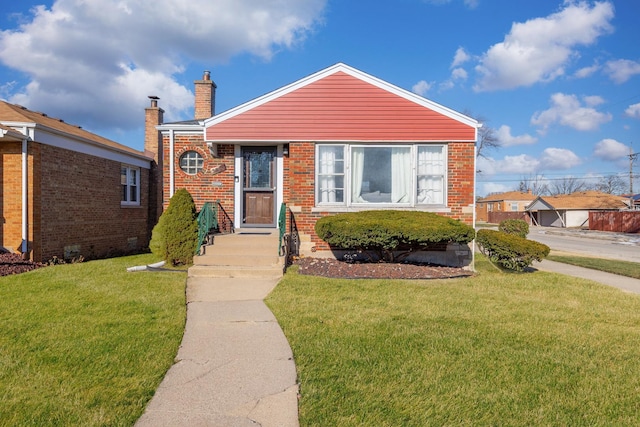 bungalow-style house featuring a front yard