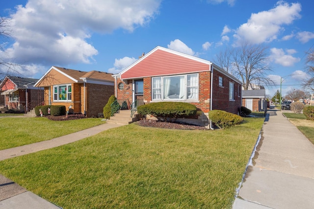 bungalow-style home featuring a front yard