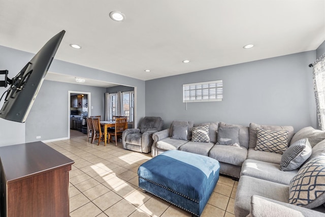 living room with light tile patterned flooring