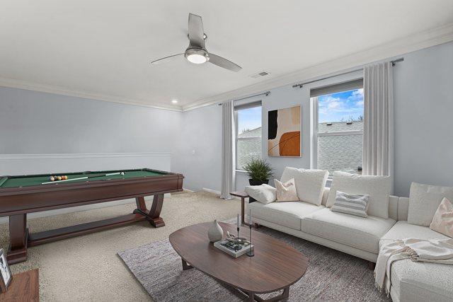 game room featuring ceiling fan, ornamental molding, and pool table