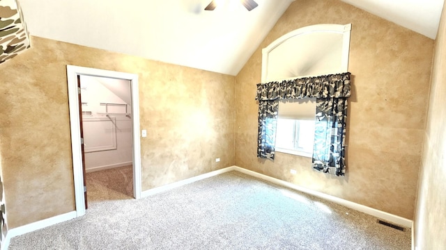 26357 S Lyndsay Dr, Channahon, IL 60410 - unfurnished bedroom with vaulted ceiling, carpet floors, and a ceiling fan