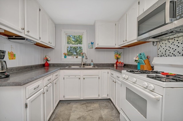 kitchen featuring white cabinetry, sink, and white gas range oven