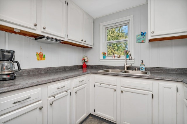 kitchen with sink and white cabinets