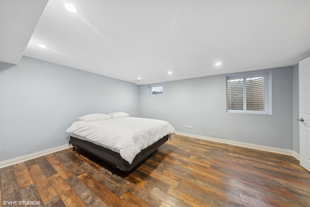 bedroom featuring dark hardwood / wood-style flooring