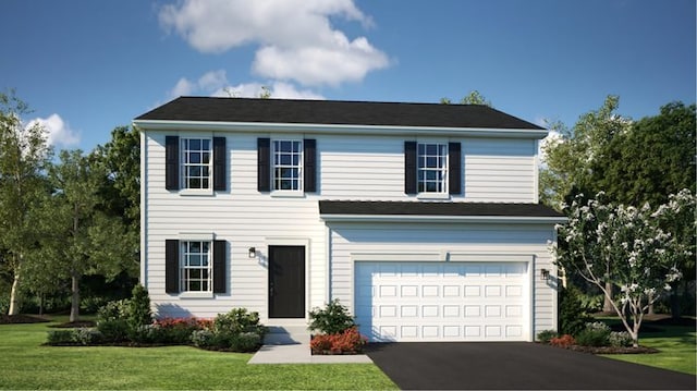 view of front facade featuring a garage and a front yard