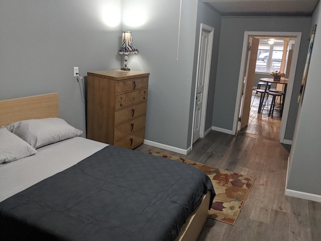 bedroom featuring wood-type flooring