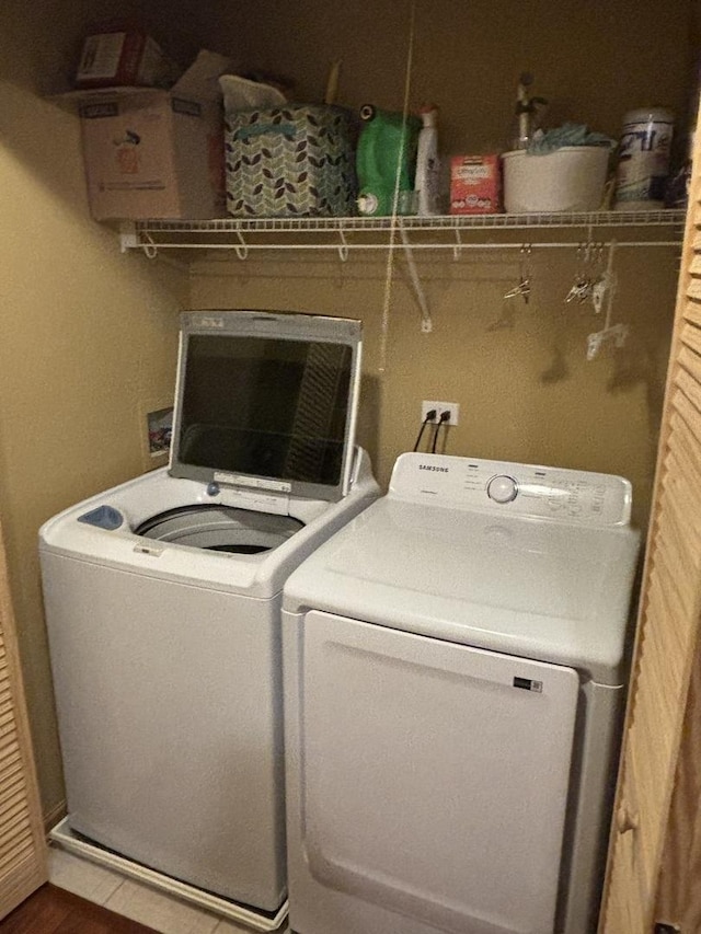 laundry room with washer and clothes dryer