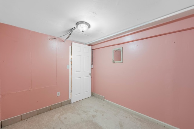 basement with light colored carpet